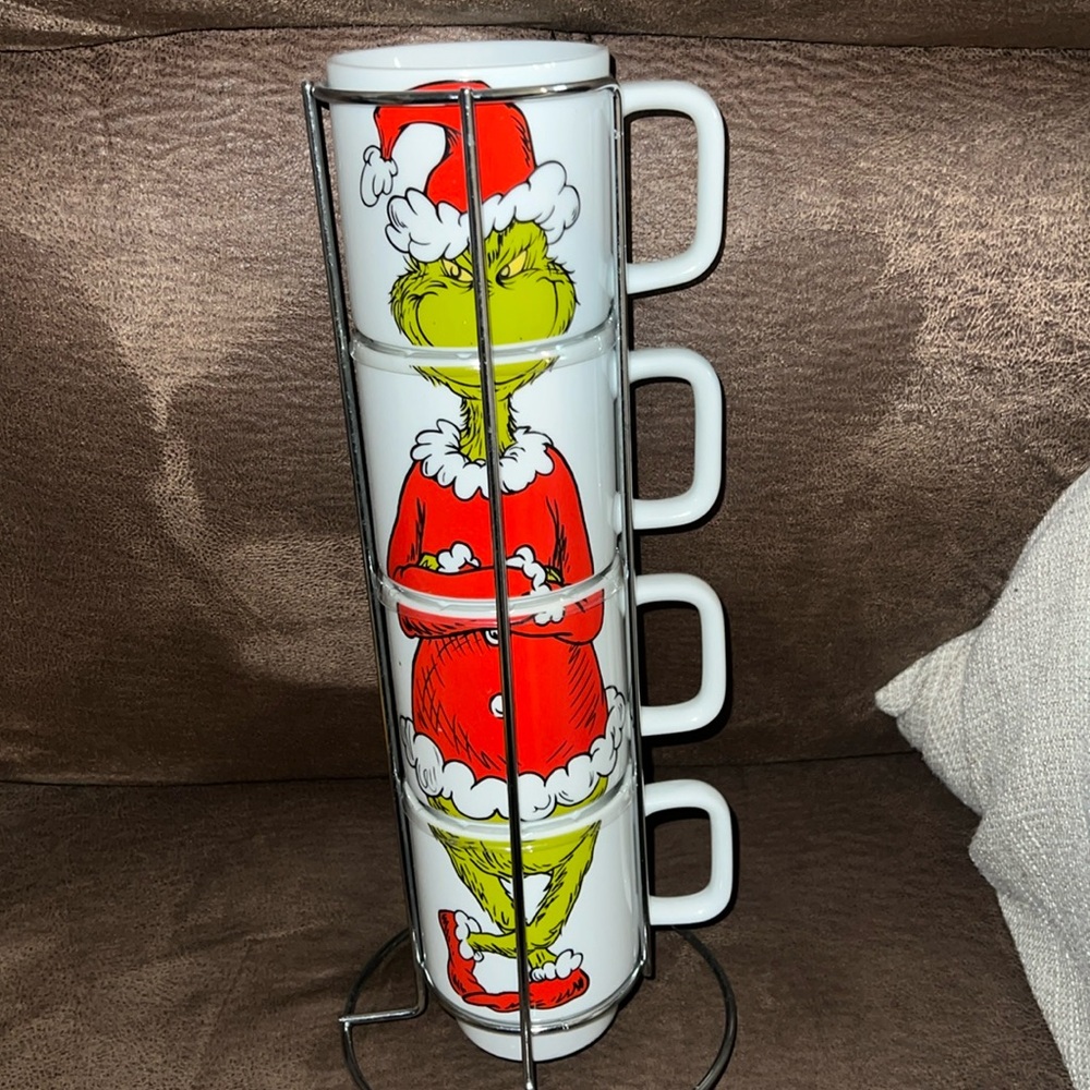 Grinch stacked Xmas mugs